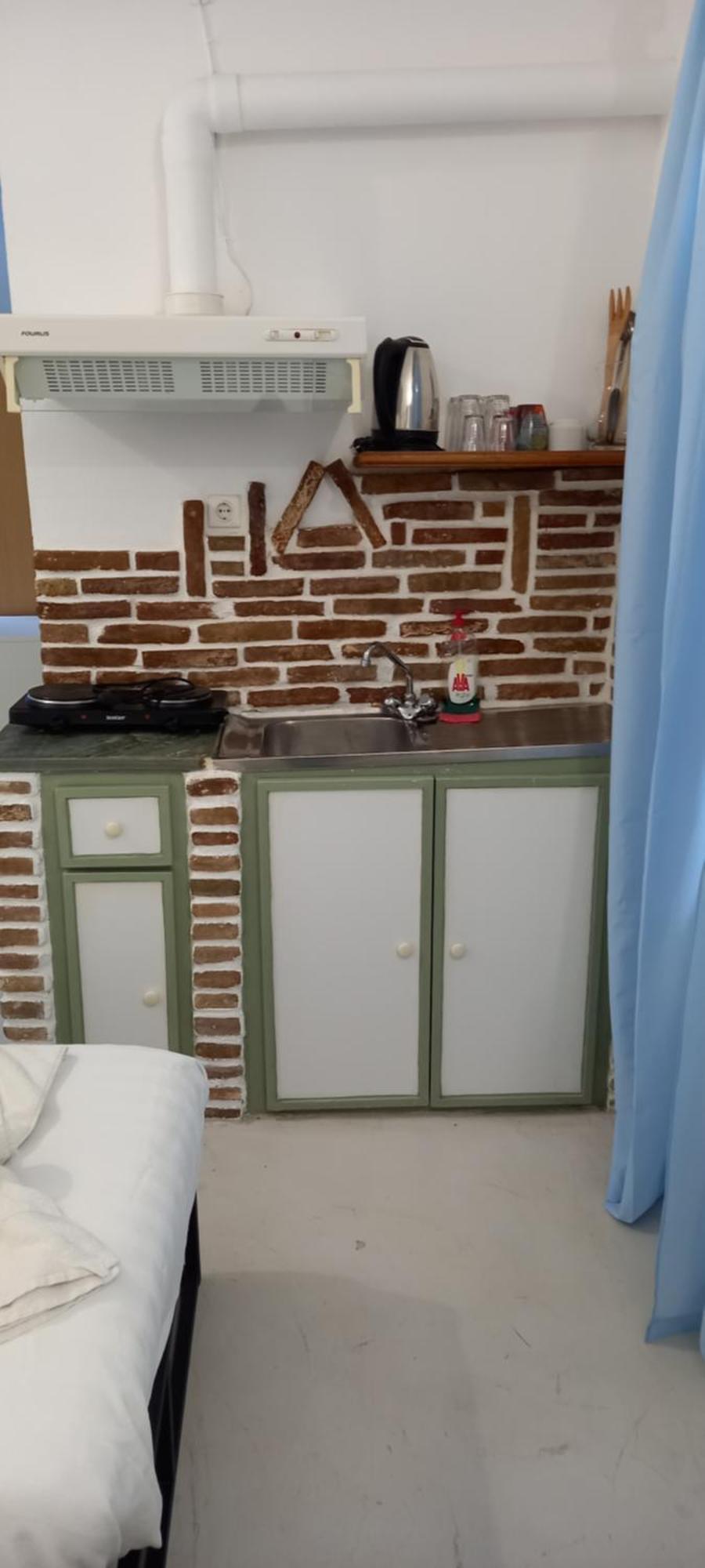 Aposperitis Rooms & Apartments Kini Bagian luar foto